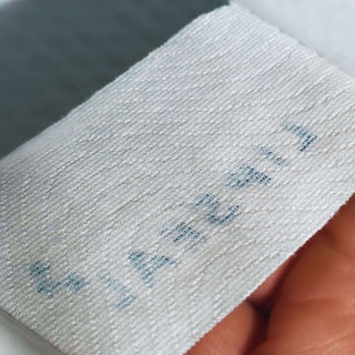 Close-up of LIPSEAL sleep strip texture and gentle adhesive design