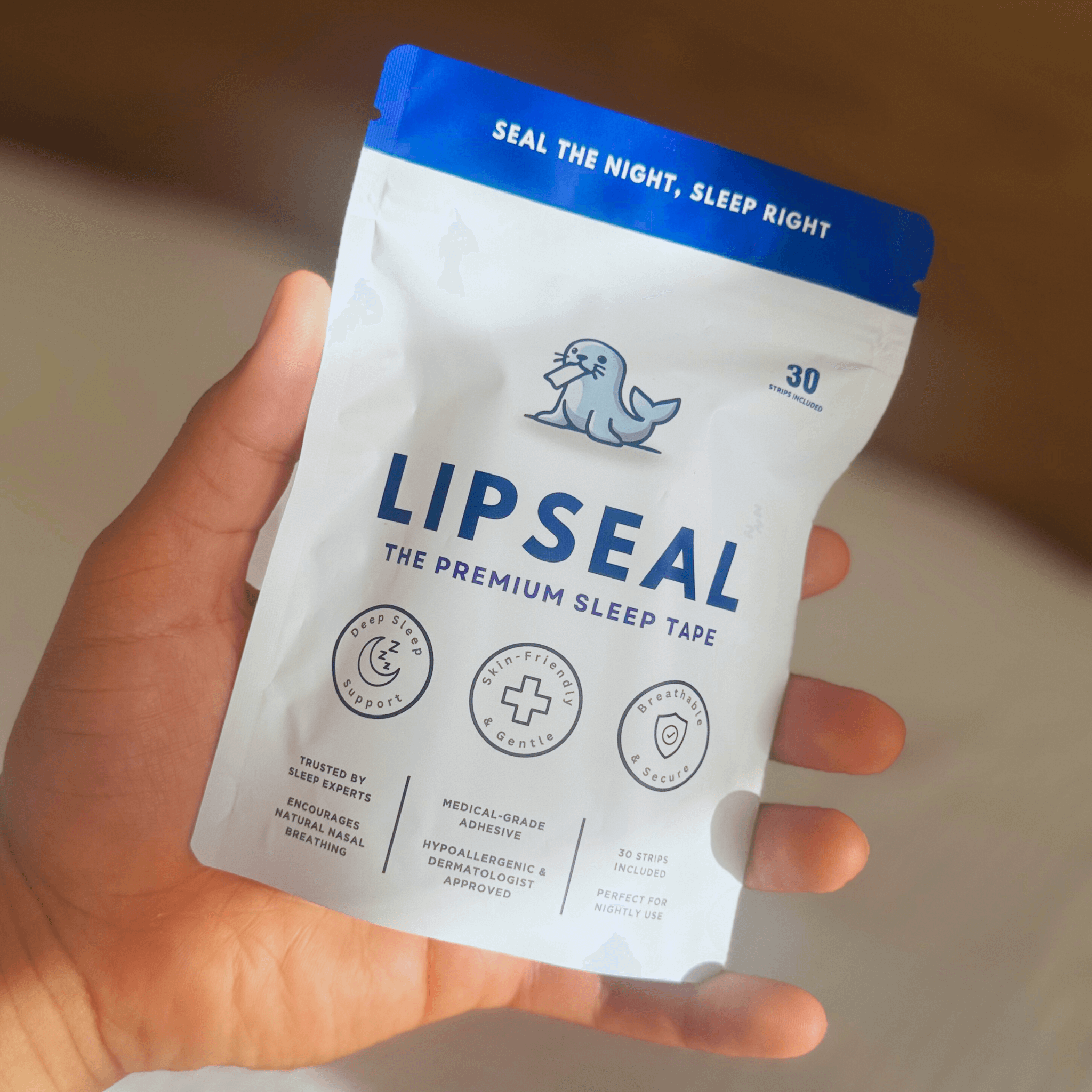 LIPSEAL mouth tape pouch held in hand, showing premium sleep tape packaging